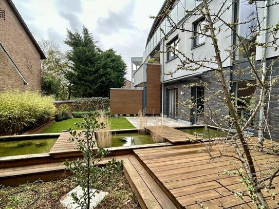 Stadthaus mit schön angelegtem Garten und Tiefgaragenstellplatz