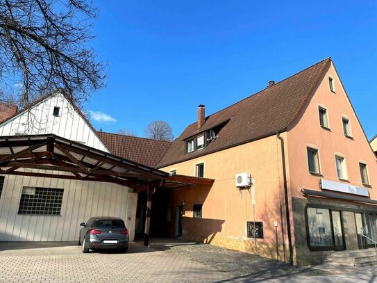 Haus mit Ladengeschäft mit 2 Wohnungen