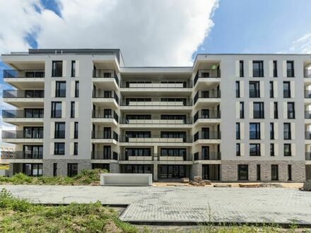 Erstbezug im Neubau: Schöne Gartenwohnung mit 3 Zimmern und offenem Wohn-/ Kochbereich in Schönefeld