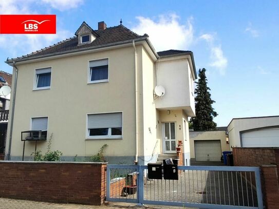 ***Gemütliches Einfamilienhaus mit 2 Wohnungen, großem Garten und viel Potential in Stockstadt***