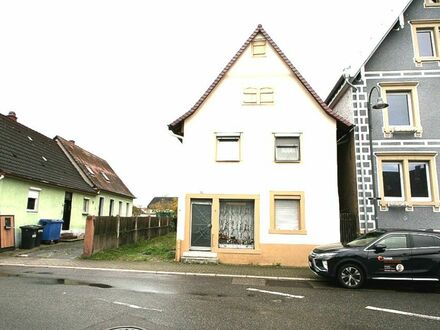Baugrundstück - mit Bestandsgebäuden
Abrisshaus in Staffort - 1.655 u. 603 m²
Gebäude-u. Gartenfl.