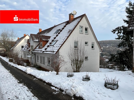 Attraktive Wohnung mit viel Tageslicht, Terrasse eigenem Gartenanteil und Fernblick!