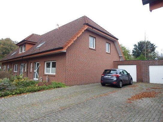 ***BUESCHER IMMOBILIEN*** Schickes Reihenendhaus mit Teilkeller, Garage und Eigentumsgrundstück in zentraler Wohnlage v…