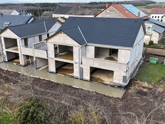 HOCHWERTIGE NEUBAUWOHNUNG MIT PRIVATEM GARTEN DIREKT AN DER GRENZE LUXEMBURG