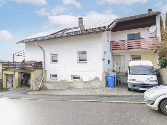 Gepflegtes Einfamilienhaus mit viel Platz und großem Garten in familienfreundlicher Lage