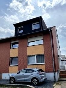 3 Familienhaus, Garagenhalle, bereits aufgeteilt in Eigentumswohnungen.