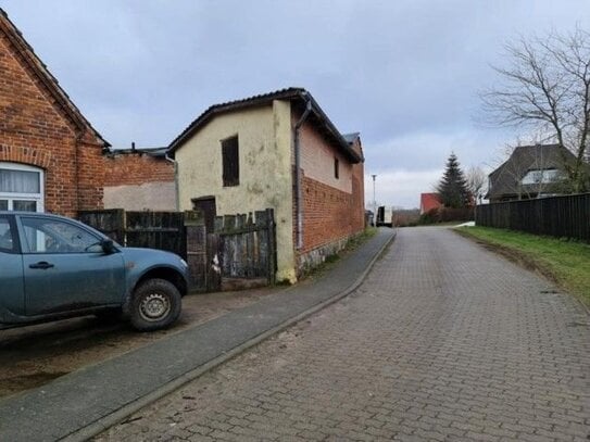 Baugrundstück mit einem alten Wohnhaus