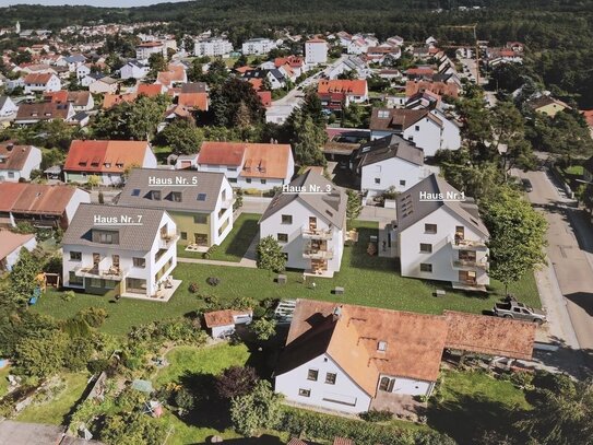 Ruhige, grüne und begehrte Wohnlage: 3,5-Zimmer-Neubauwohnung mit Terrasse und Gartenanteil