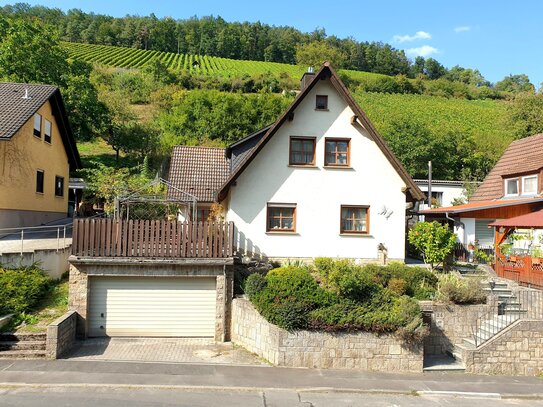 Einfamilienhaus in Karlstadt – Traumhaftes Wohnen nahe Würzburg mit großzügigen Terrassen