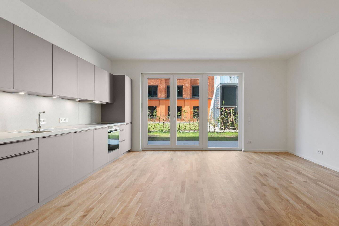 Erstbezug * 3 Zimmer - Gartengeschosswohnung * Terrasse/Gartenanteil * Einbauküche * TG SP möglich - Photo 1