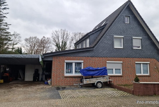 Ritterhude - 2-Parteien-Rotklinkerhaus mit Zeitmietverträgen, Doppelcarport, in einer Sackgasse.