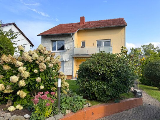 Charmantes Einfamilienhaus mit Garten und Garage