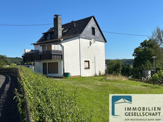 Zweifamilienhaus mit schönem Gartengrundstück; tlw. vermietet, in Ortslage von Siebenmorgen