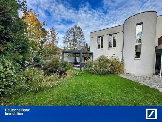 Haus-in-Haus Bauart: Geräumige Wohnung mit idyllischem Garten und modernem Komfort!