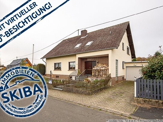 Großzügiges Ein- oder Zweifamilienhaus mit ebenem Garten und Garage in Sierscheid