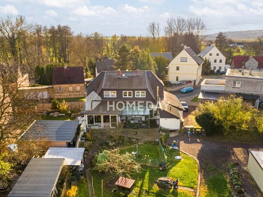 Idyllisches EFH mit Einliegerwohnung, großem Grundstück, Terrasse und 4 Garagen in Milzau