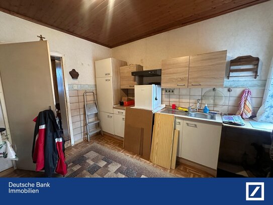 Sanierungsbedürftiges Reihenmittelhaus in Jülich-Kirchberg - Ideal für Handwerker