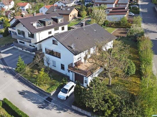 Gepflegtes Einfamilienhaus mit großem Garten, Garage und Erweiterungsmöglichkeit im DG