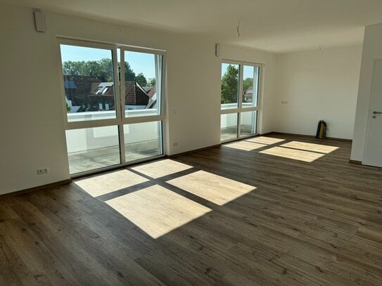 Neubau Dachgeschoss Wohnung mit Dachterrasse, Keller und 2 TG Plätze