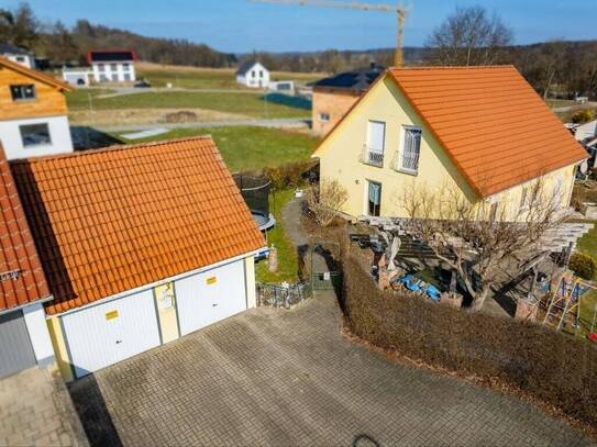 Perfekt für Ihre Familie! Einfamilienhaus mit großem Garten und Doppelgarage im ruhigen Wohngebiet