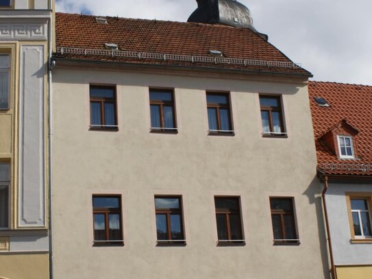 Zwei Wohnungen, ein Gewerbe in Stadtzentrum.