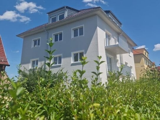 Wunderschöne Familienwohnung mit Terrasse und eigenem Garten im Erstbezug!