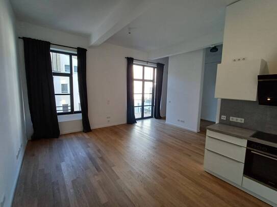 Modernität und gutes Design - Singlewohnung mit Balkon + EBK