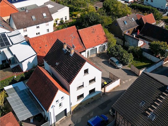 Familienparadies mit Potenzial: Geräumiges Haus und Baugrundstück in ruhiger Lage von Groß-Gerau