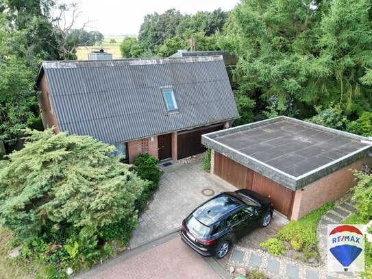 Außergewöhnliches Architektenhaus mit Einliegerwohnung in sehr schöner und ruhiger Wohnlage !