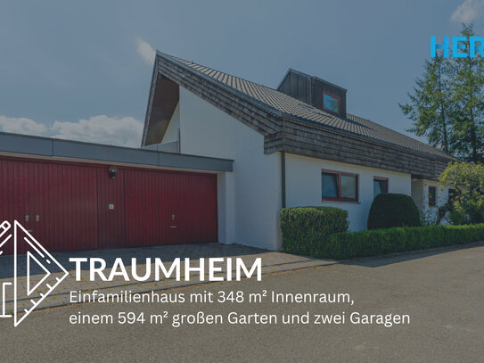 TRAUMHEIM - Einfamilienhaus mit 348 m² Innenraum, einem 594 m² großen Garten und zwei Garagen