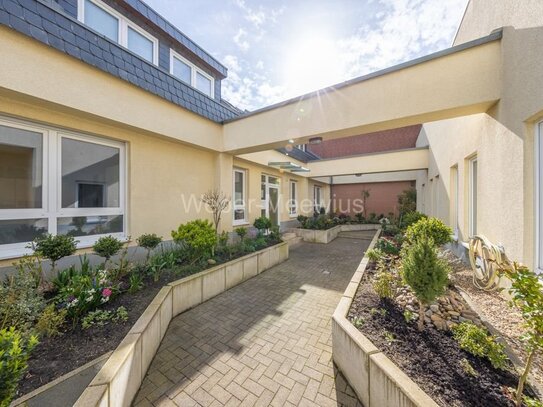 Attraktive 4-Zimmer-Maisonettewohnung, 2 TG-Stellplätze, Dachterrasse in Südwestlage