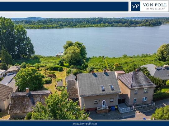 Großes Wohnhaus mit fantastischem Wasserblick, sanierungsbedürftig, vermietet