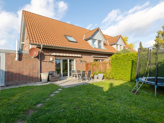 Familienfreundliches Reihenendhaus mit Carport und Garten!