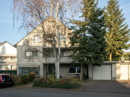 Zentrum Rösrath: Mehrfamilienhaus in zentraler Lage mit Baugenehmigung für Erweiterung!