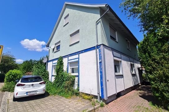 Mehrfamilienhaus mit 3 Wohnungen und Einliegerwohnung als Kapitalanlage