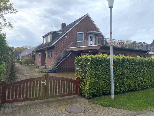 Einfamilienhaus mit Anbau, 2 Garagen und Carport in zentraler und doch ruhiger Lage von Sandkrug