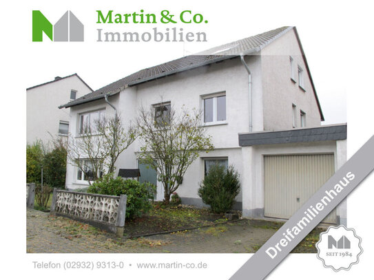 Solides Dreifamilienhaus mit Potential.