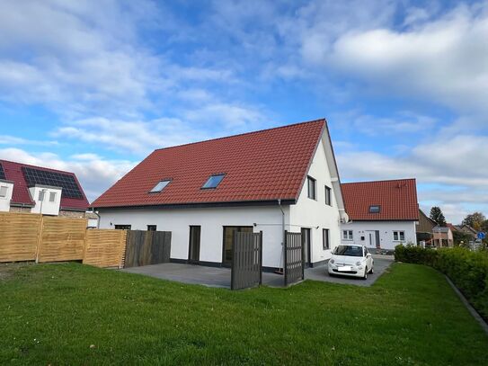 Moderne Doppelhaushäfte mit großem Garten in Bielefeld Jöllenbeck