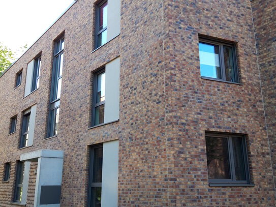 Helle Familienwohnung im Erdgeschoss mit Terrasse und Garten