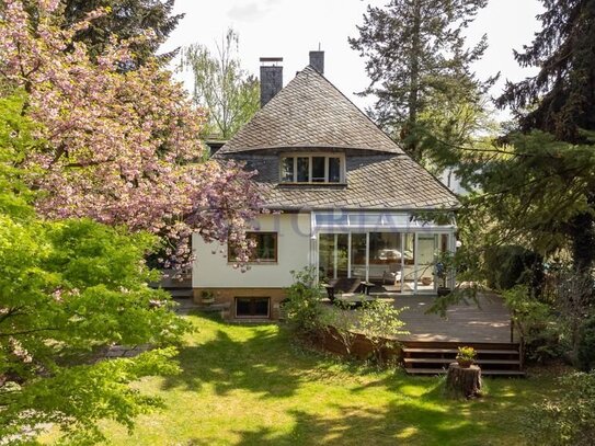 Einzigartiges Einfamilienhaus in Zehlendorf mit romantischem Garten