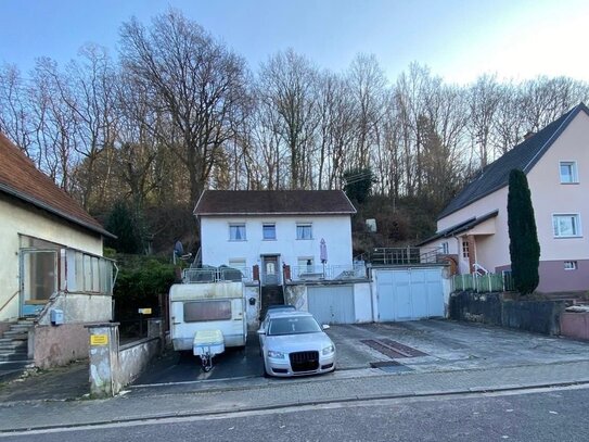 1 FH mit begehbarer Felsenhöhle (Bunker) und tollem Gartenplateau in Bübingen