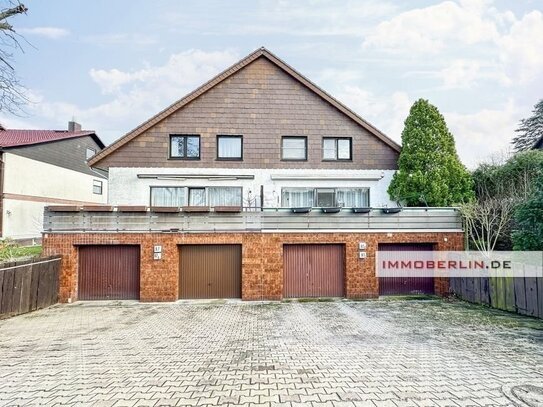 IMMOBERLIN.DE - Hausähnliche Wohnung mit Terrasse, Garten + Garage in naturverbundener Lage