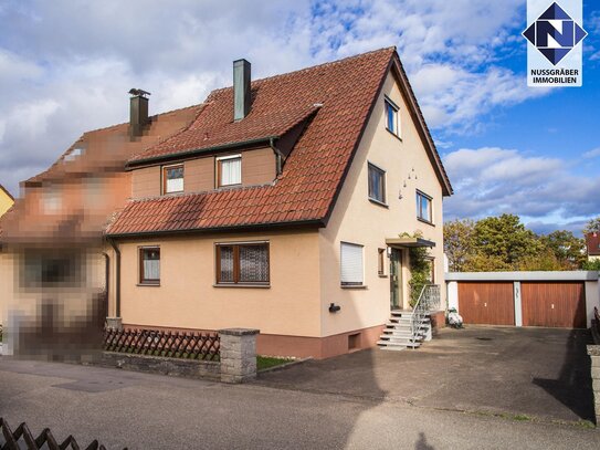 Gepflegte Doppelhaushälfte mit großzügigen Zimmern, Terrasse, Garten und Doppelgarage