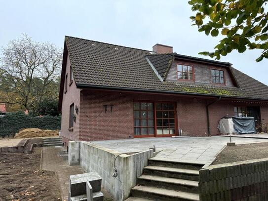 Attraktive Doppelhaushälfte mit Vollkeller, West Terrasse und Doppelcarport in ruhiger grüner Ortslage