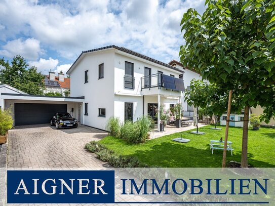 AIGNER - Modernes Einfamilienhaus mit sonnigem Garten, Pool und KfW-40+-Standard