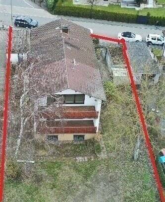 Bauträgergrundstück mit Altbestand in Erlangen-Bruck – Ihre Chance für ein neues Wohnprojekt