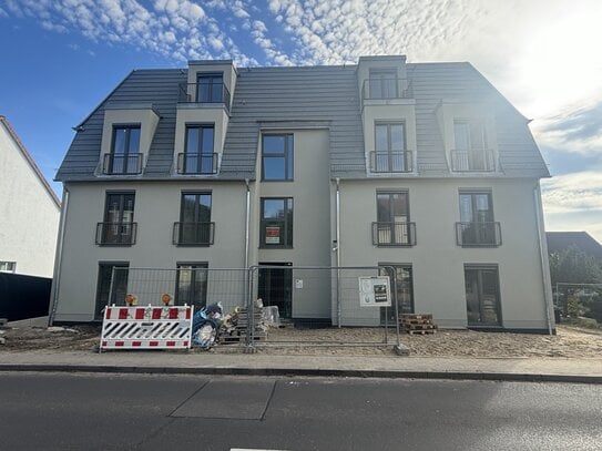 große süd-westlich ausgerichtete Terrasse, moderne 4-Zimmerwohnung mit Garten, Erstbezug zum 01.12.2024