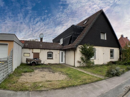 Wohnung in einer Doppelhaushälfte mit eigenem Garten