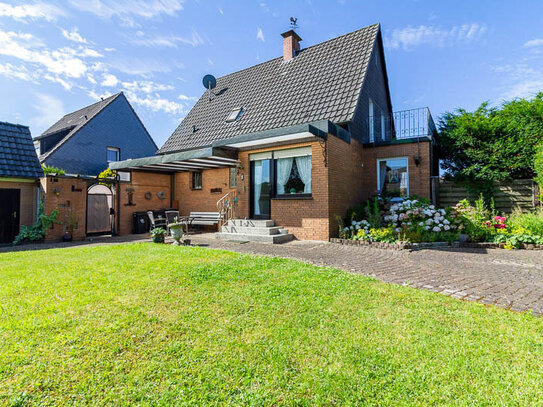 Gepflegtes Einfamilienhaus mit Potenzial und großzügigem Garten in ruhiger Nachbarschaft!