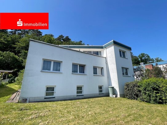 Einfamilienhaus mit außergewöhnlicher Raumaufteilung und Dachterrasse mit Fernblick!